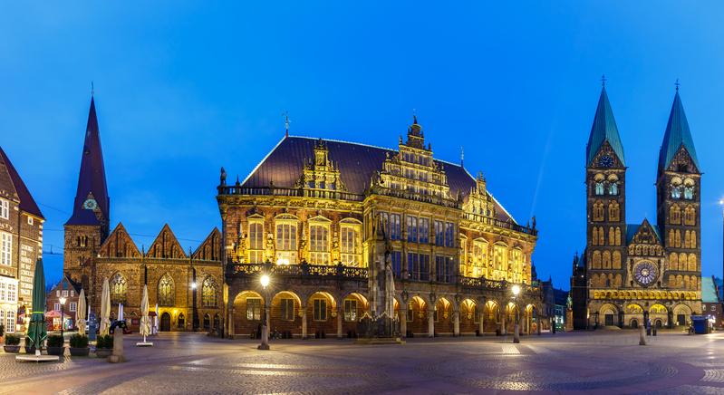 Bremen market square town hall Dom church Roland panoramic view in Germany at night blue hour
