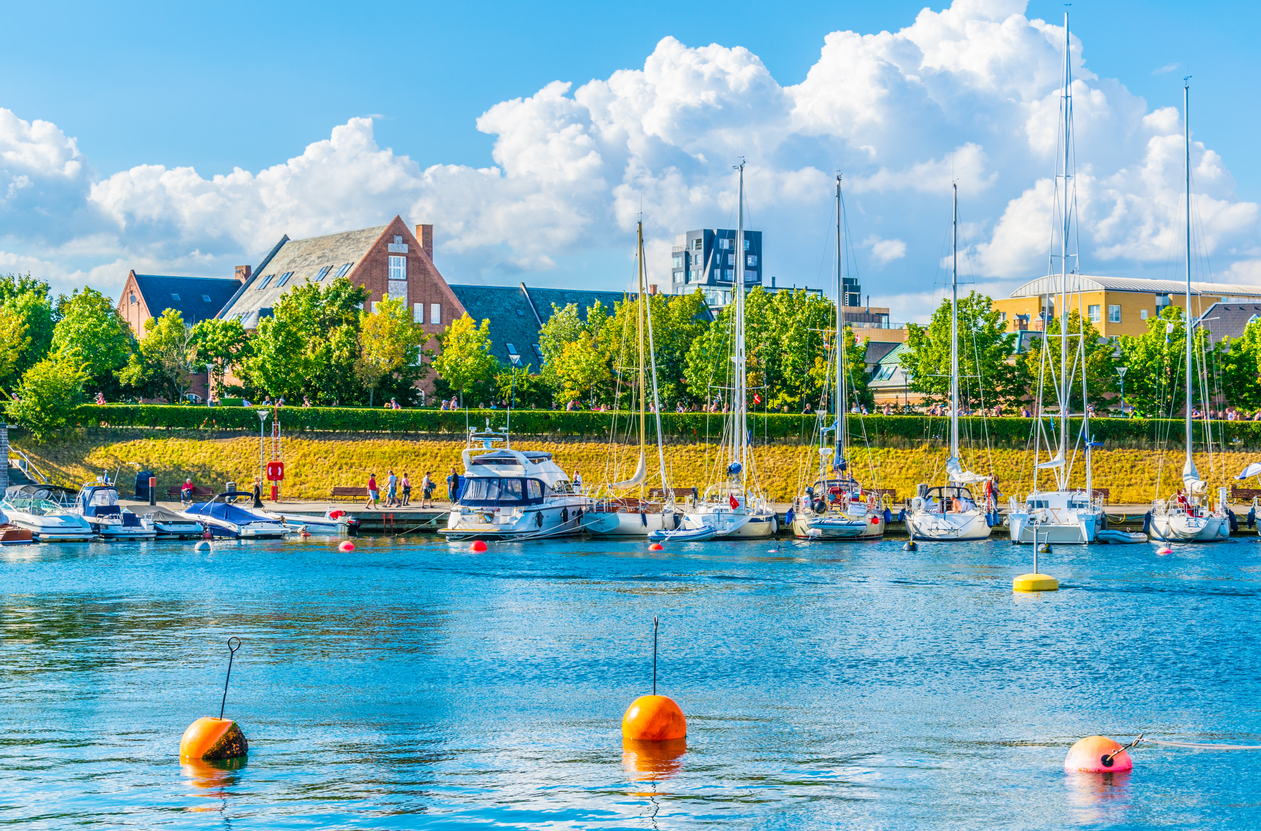 Yachts moored at copenhagen marina.